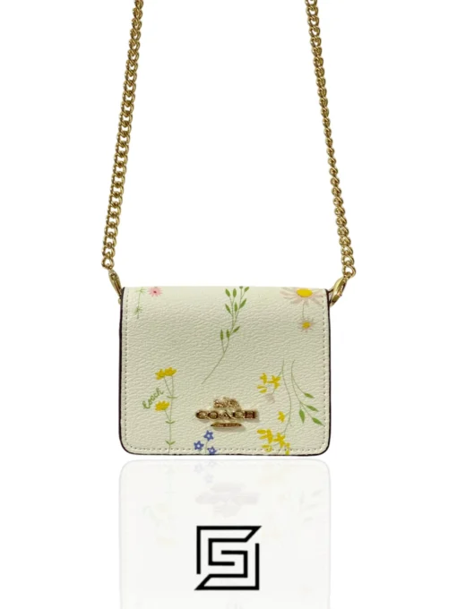 Coach MINI WALLET shops WITH SPACED WILDFLOWER PRINT